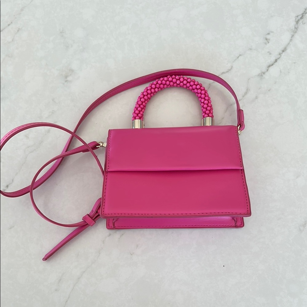 Zara Pink Crossbody Bag with Braided Handles and Flap Closure